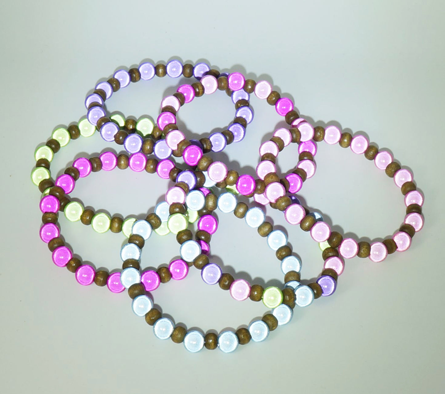 Cute Set of 7 Colorful Miracle Glow Beaded Stackable Stretch Bracelets, Gift for Her